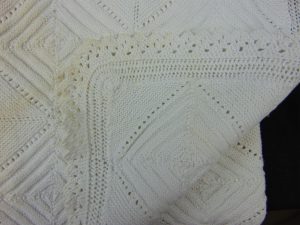 a portion of the counterpane baby blanket