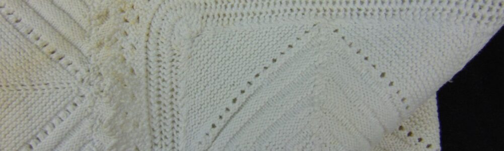 a portion of the counterpane baby blanket