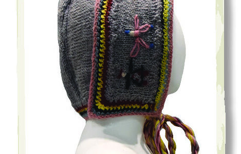 Bonnet knitted with worsted weight purple/grey wool
