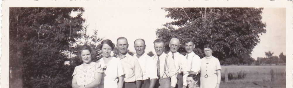 The Charles Wheeler Family, standing in birth order; youngest to oldest, L-R Myrtle, Lena, Cecil, Jesse, Lennie, Ernie, Herb, Carrie